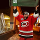 Hurricanes defenseman Bret Hedican celebrates his team's victory in the quiet, empty streets of Raleigh, causing shocked residents to wonder what is going on.